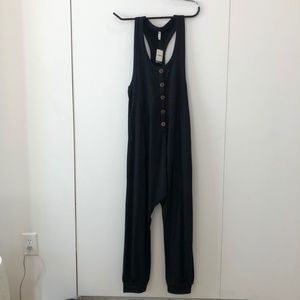 Free People - black medium super comfy adult onezie, new with tags